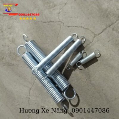 Hình ảnh bộ lò xo gắp phuy
